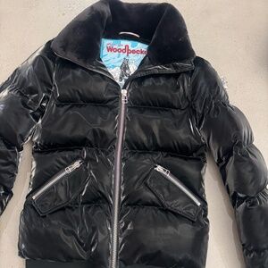 Woodpecker brand down bomber jacket size small color black with Faux Fur collar.
